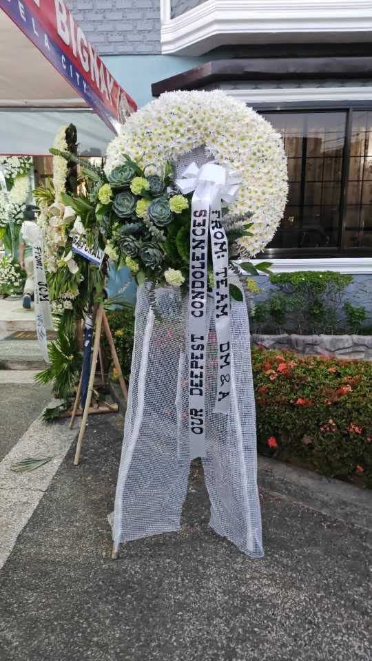 Everlasting Peace white condolence wreath-style funeral stand in Manila