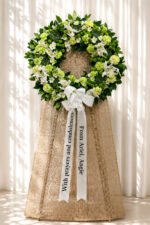 Peace Be With You - Green Carnation, Succulent & White Lily Funeral Wreath